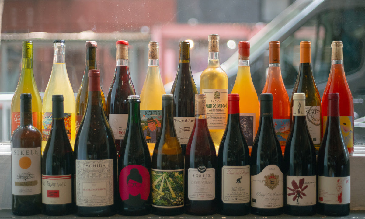 Wine bottles on windowsill