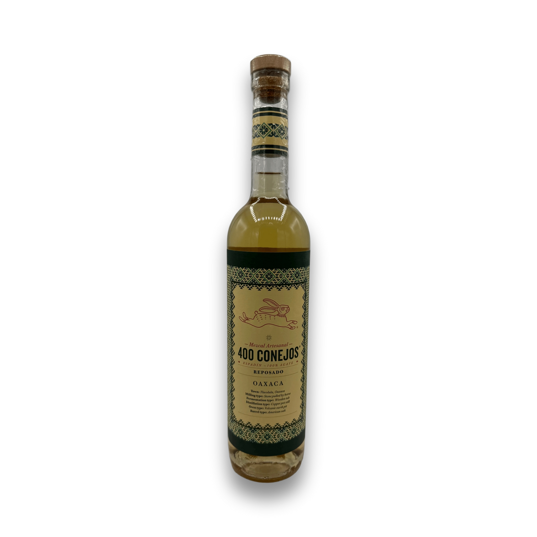 400 Conejos Reposado tequila bottle with geometric label and rabbit logo