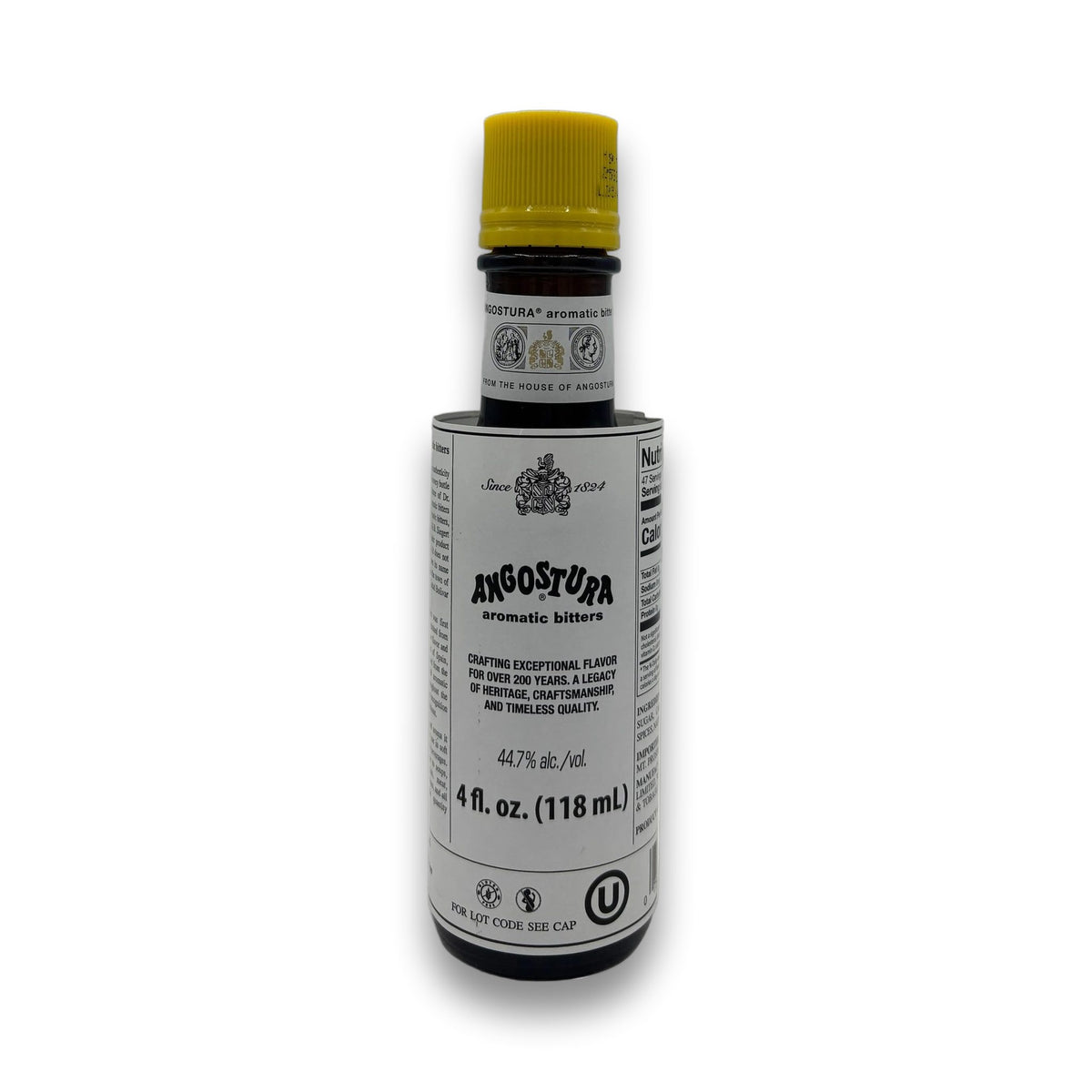 Angostura Aromatic Bitters 4oz dark glass bottle with yellow cap and heritage label