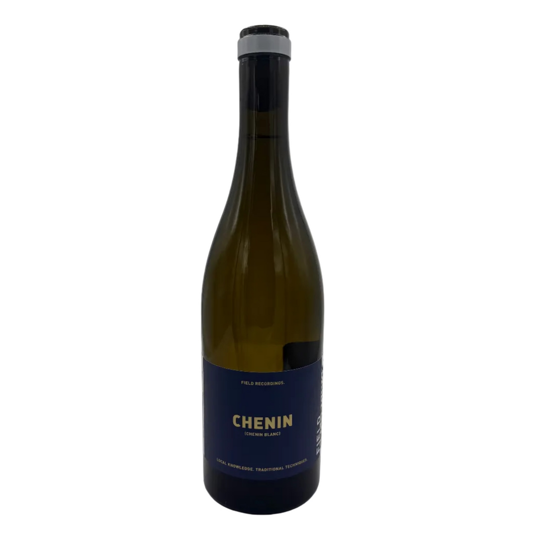 Californian white wine bottle, with a dark blue label and yellow text in the center writing &