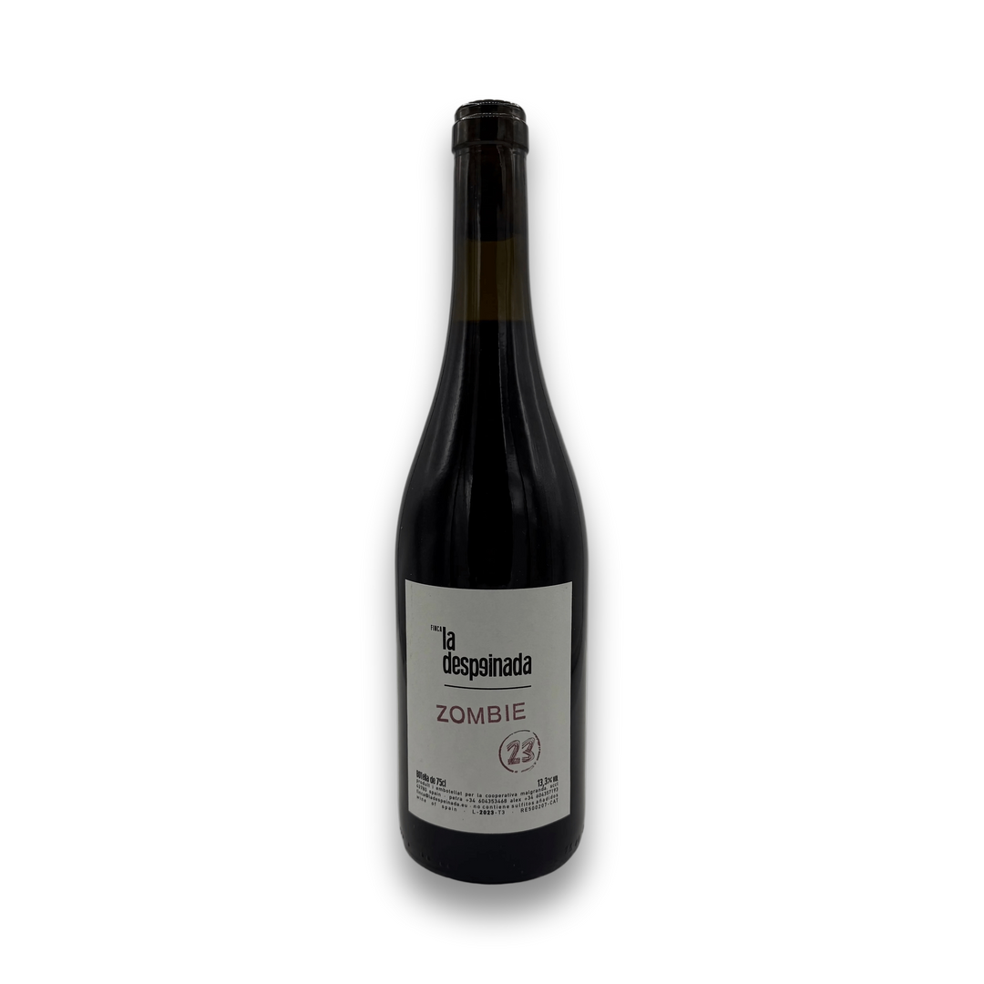 Wine bottle with a label illustrating the text 'zombie' in light purple on a white background