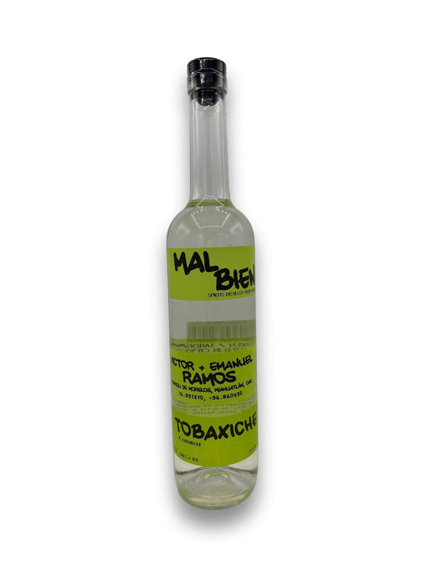 Mal Bien Tobaxiche Ramos Mezcal bottle with lime-green label and black cap