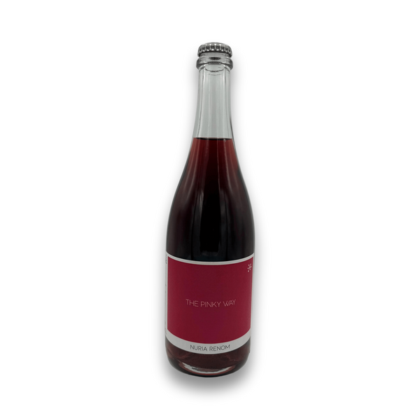 Nuria Renom The Pinky Way 2023 sparkling wine bottle with deep pinkish-red liquid and matte red label