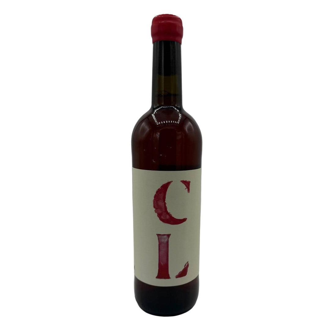 Wine bottle with a red cap and label on a white background