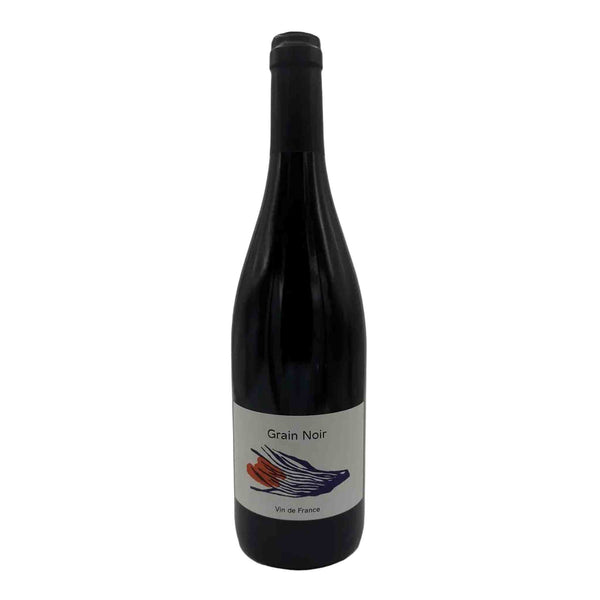 Wine bottle with a label illustrating drawing of orange and blue lines on a white surface