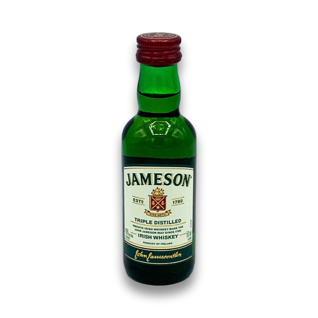 Mini bottle of Jameson Irish Whiskey on a white background