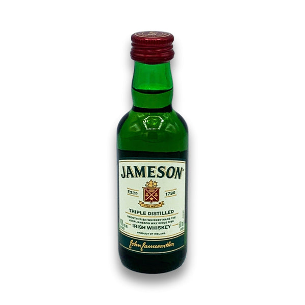 Mini bottle of Jameson Irish Whiskey on a white background